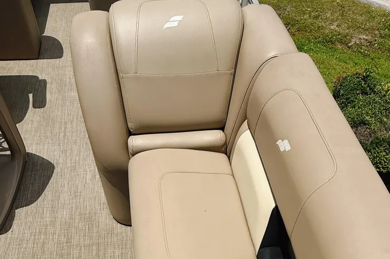 Slide: The Image of Beige seating on 2022 Starcraft LX22 boat, featuring comfortable upholstery and stylish design. - 11