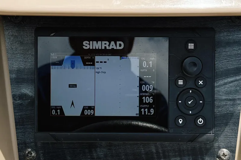 Slide: The Image of Simrad display on 2022 Starcraft LX22 boat showing navigation and depth data. - 37