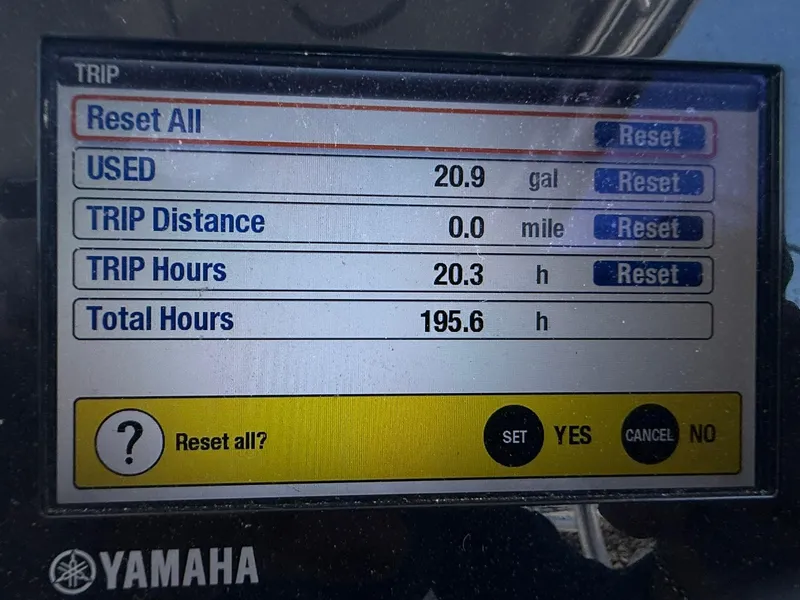 Slide: The Image of Yamaha trip display showing fuel usage and hours for Robalo R245 Walkaround 2014. - 7