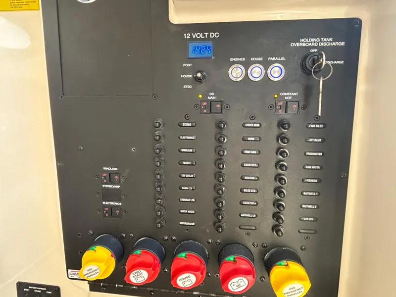 Slide: The Image of Control panel of a 2018 Scout 275 LXF boat with switches and indicators. - 28