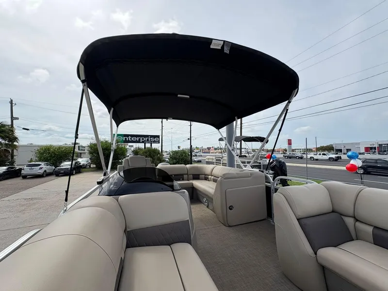 Slide: The Image of 2023 Sun Tracker Party Barge 20 DLX pontoon boat with spacious seating and canopy. - 7