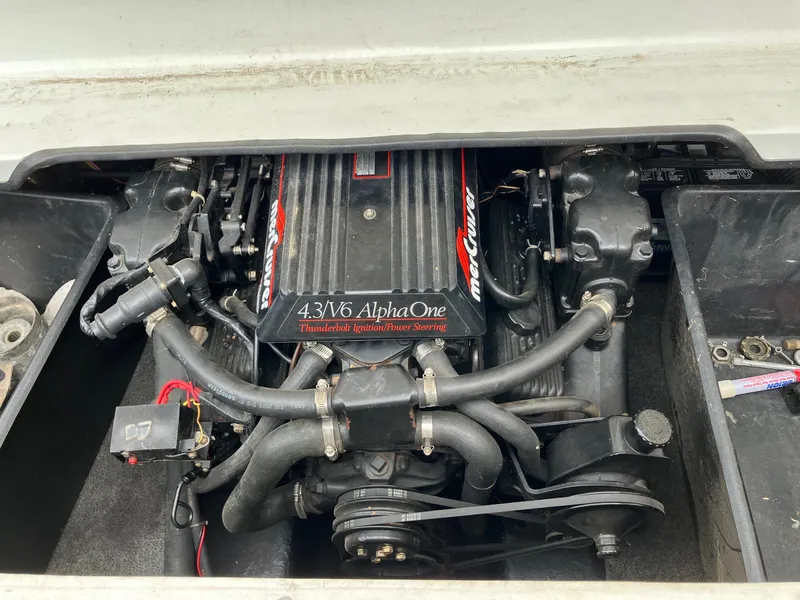 Slide: The Image of Engine compartment of a 1989 Rinker 206 Open Bow with 4.3 V6 Alpha One engine. - 9