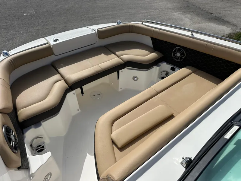 Slide: The Image of 2023 Sea Ray SDX 250 Outboard boat with spacious tan seating and modern design. - 12