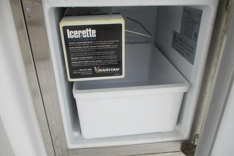 Slide: The Image of Ice maker inside 2006 Carver 466 Motor Yacht, featuring Raritan Icerette automatic ice cube maker. - 28