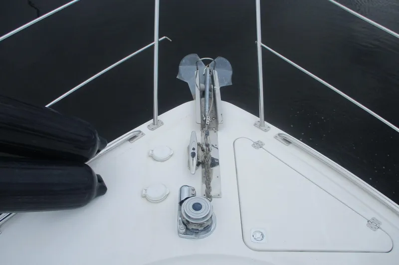 Slide: The Image of Bow of 2006 Carver 466 Motor Yacht with anchor and railing. - 20