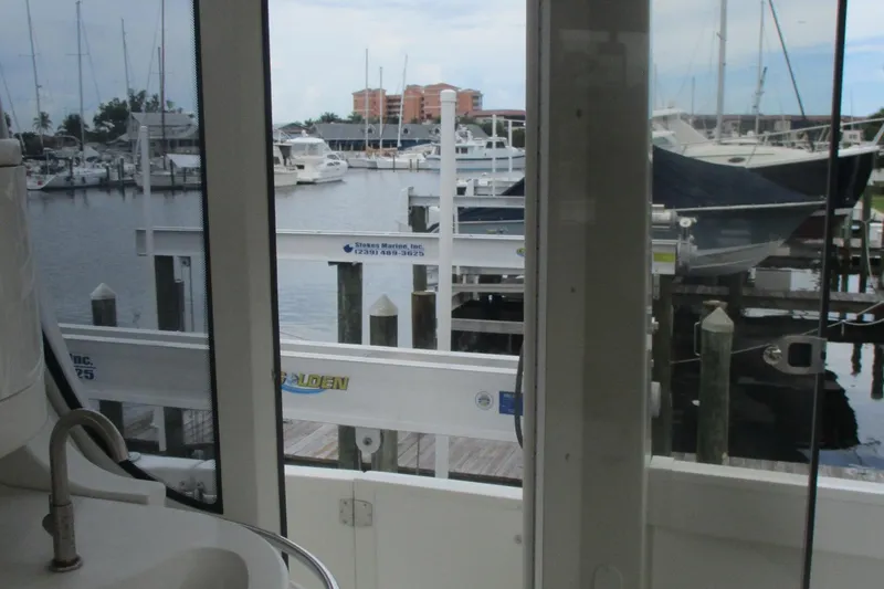 Slide: The Image of View from 2006 Carver 466 Motor Yacht overlooking marina with boats and docks. - 29