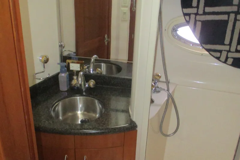 Slide: The Image of Bathroom interior of 2006 Carver 466 Motor Yacht with sink and shower. - 38
