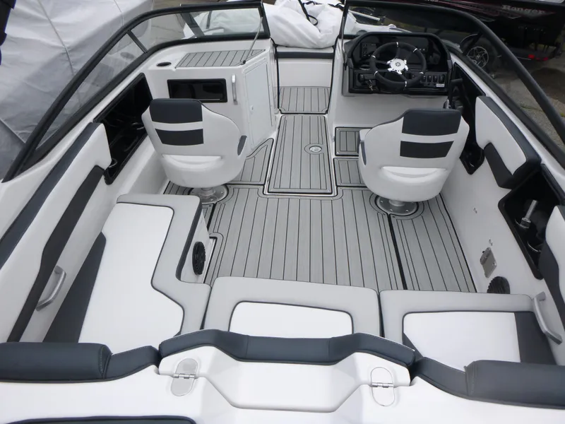 Slide: The Image of 2025 Yamaha Boats 195S interior with sleek seating and modern dashboard design. - 4