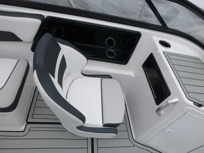 Slide: The Image of Interior of 2025 Yamaha Boats 195S, featuring sleek seating and modern dashboard design. - 8