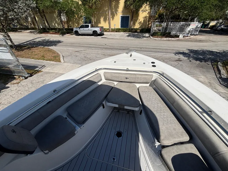 Slide: The Image of 2022 Sea Pro 239 Center Console boat with spacious seating and sleek design. - 8