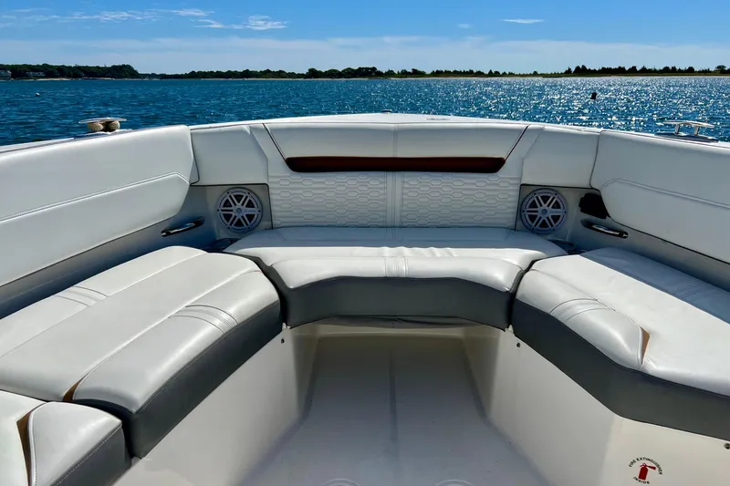 Slide: The Image of 2020 Tiara Yachts 43 LS boat interior with luxurious seating and scenic water view. - 11