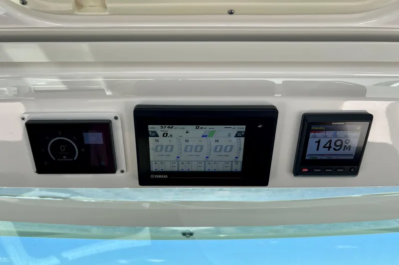 Slide: The Image of Dashboard of 2020 Tiara Yachts 43 LS with Yamaha and Garmin displays. - 14