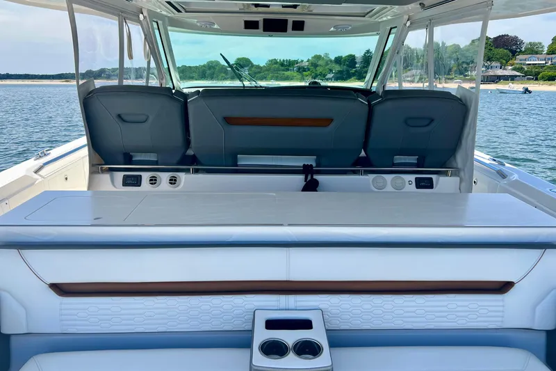 Slide: The Image of 2020 Tiara Yachts 43 LS interior with seating and ocean view. - 9