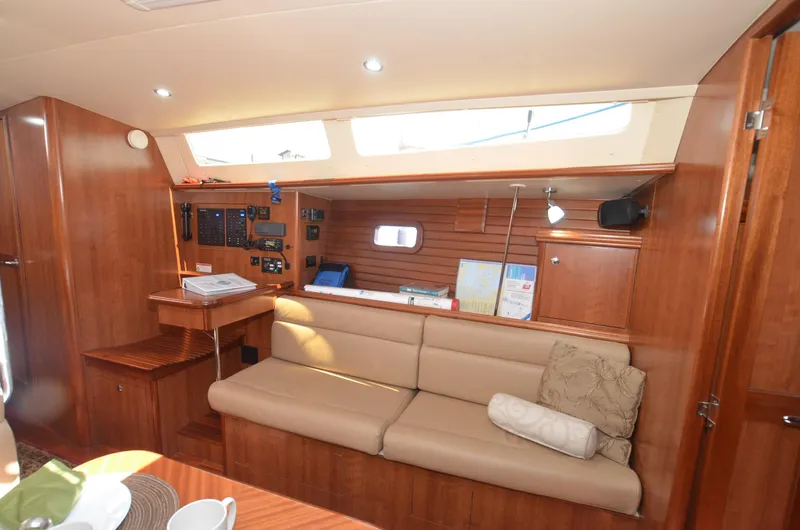 Slide: The Image of Interior of 2016 Marlow-Hunter 40 yacht with beige seating and wooden finishes. - 17