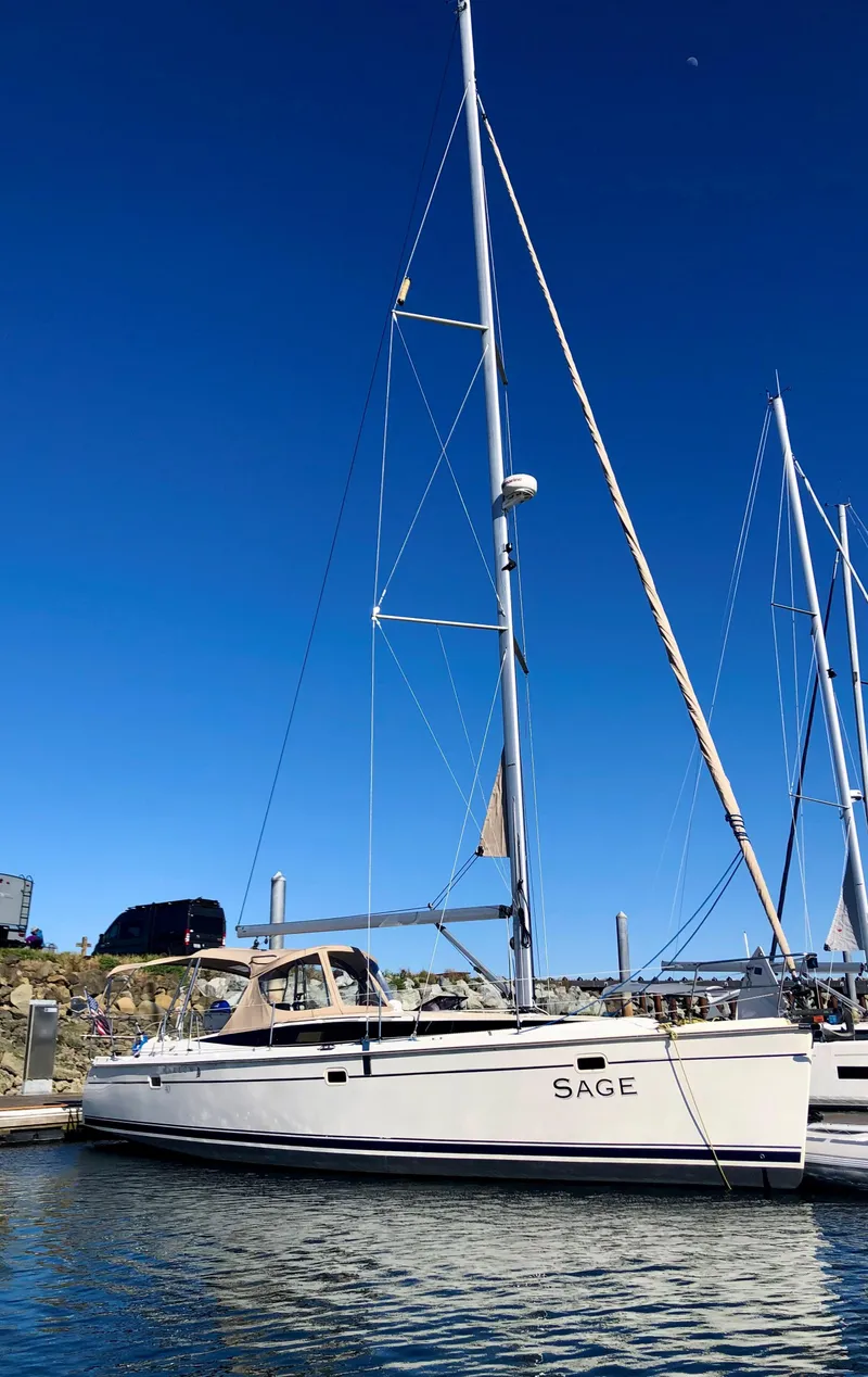 Slide: The Image of 2016 Marlow-Hunter 40 sailboat docked under clear blue sky. - 3