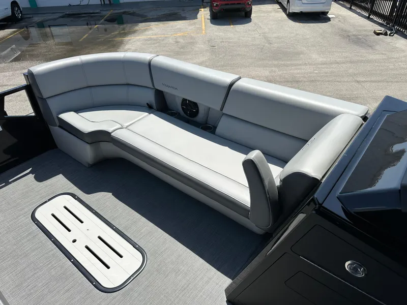 Slide: The Image of 2025 Veranda VX 25 RC boat interior with sleek gray seating and modern design. - 13