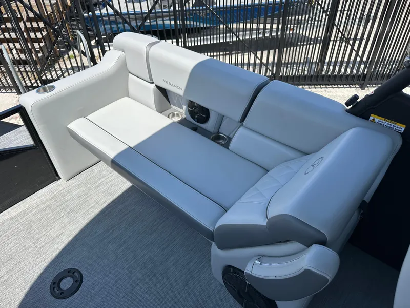 Slide: The Image of Luxurious seating on 2025 Veranda VX 25 RC pontoon boat, featuring sleek gray upholstery. - 14