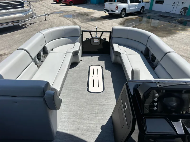 Slide: The Image of 2025 Veranda VX 25 RC pontoon boat with spacious seating and modern design. - 15
