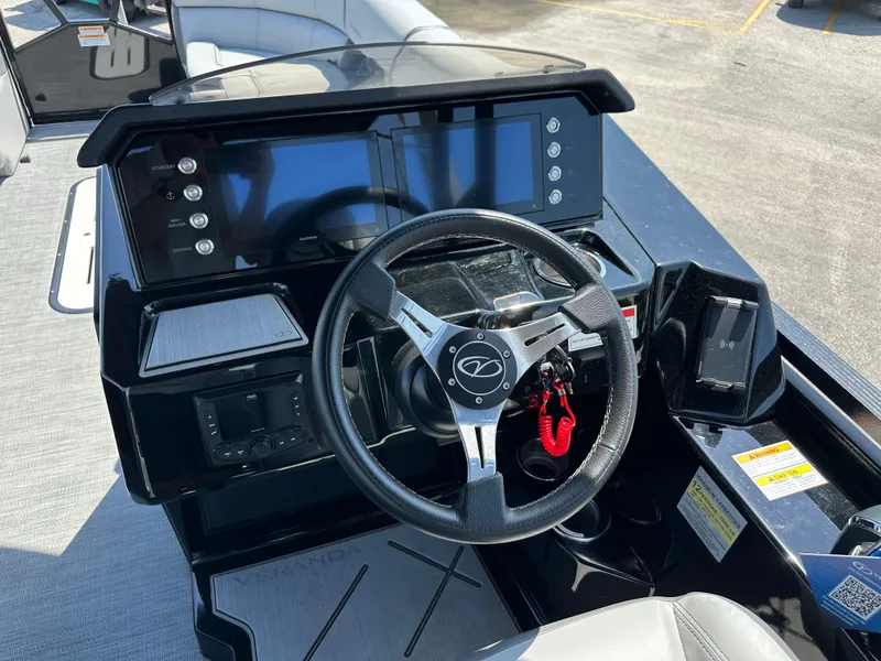 Slide: The Image of Steering console of 2025 Veranda VX 25 RC boat with modern controls and display. - 9
