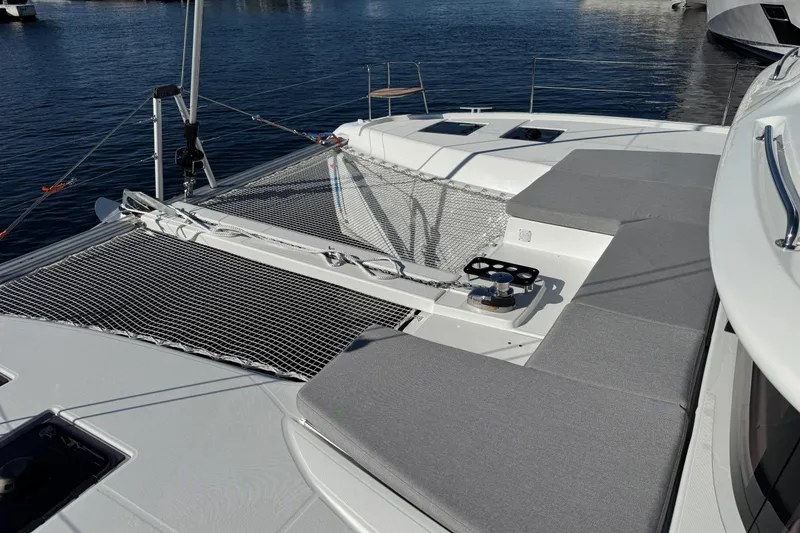 Slide: The Image of Modern Lagoon 43 yacht deck with netting and seating, 2026 model. - 22