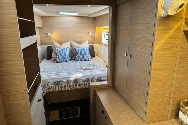 Slide: The Image of Luxurious interior of 2026 Lagoon 43 yacht with cozy bedroom and modern design. - 34