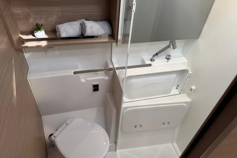 Slide: The Image of Modern bathroom in 2026 Lagoon 43 yacht with compact design and sleek fixtures. - 36