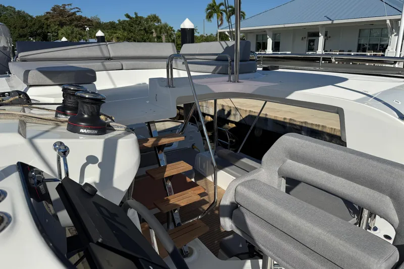 Slide: The Image of Modern Lagoon 43 yacht deck with seating, winches, and helm, 2026 model. - 42