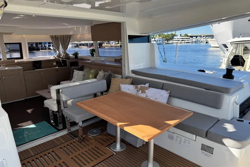 Slide: The Image of Luxurious interior of 2026 Lagoon 43 yacht with elegant seating and dining area. - 45