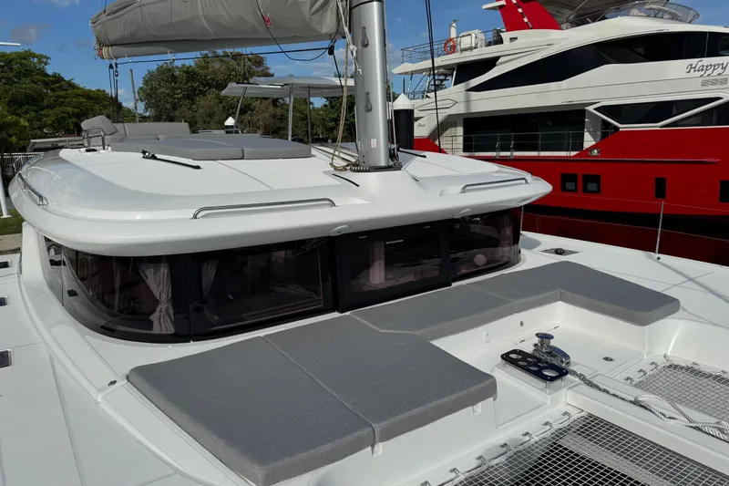 Slide: The Image of 2026 Lagoon 43 catamaran with sleek design, spacious deck, and modern amenities. - 6
