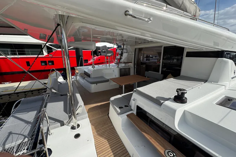 Slide: The Image of Luxurious 2026 Lagoon 43 yacht interior with modern seating and sleek design. - 7