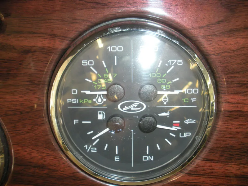 Slide: The Image of Gauge panel of a 2007 Sea Ray 220 Sundeck boat dashboard. - 15