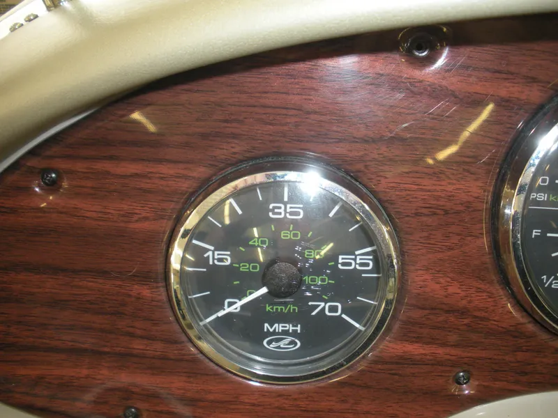 Slide: The Image of Speedometer of a 2007 Sea Ray 220 Sundeck boat, displaying speed in MPH and km/h. - 16