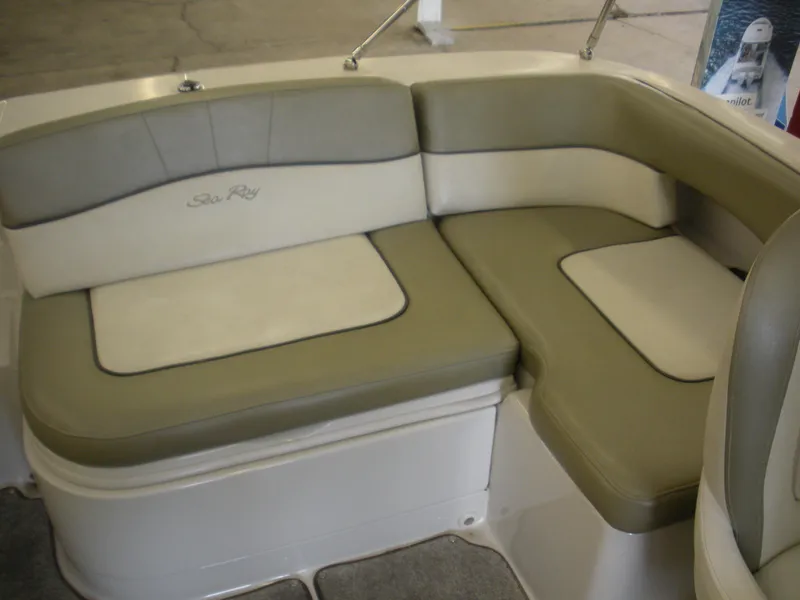 Slide: The Image of 2007 Sea Ray 220 Sundeck boat seating with beige and cream upholstery. - 28
