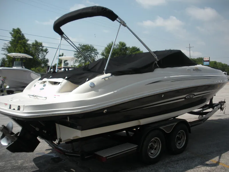 Slide: The Image of 2007 Sea Ray 220 Sundeck boat on trailer, covered and ready for transport. - 3