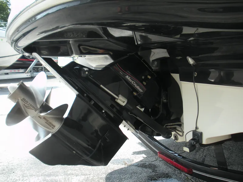 Slide: The Image of 2007 Sea Ray 220 Sundeck boat with MerCruiser engine and propeller detail. - 33