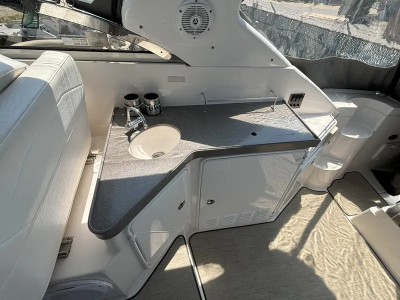 Slide: The Image of 2006 Regal Commodore 3560 IO boat interior with sink and countertop. - 11