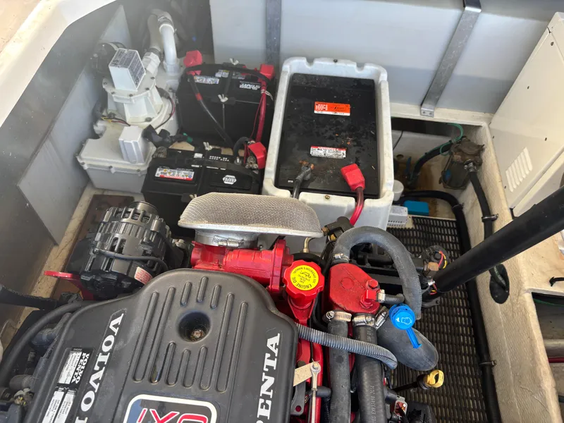 Slide: The Image of Engine compartment of a 2006 Regal Commodore 3560 IO boat with Volvo Penta components. - 22
