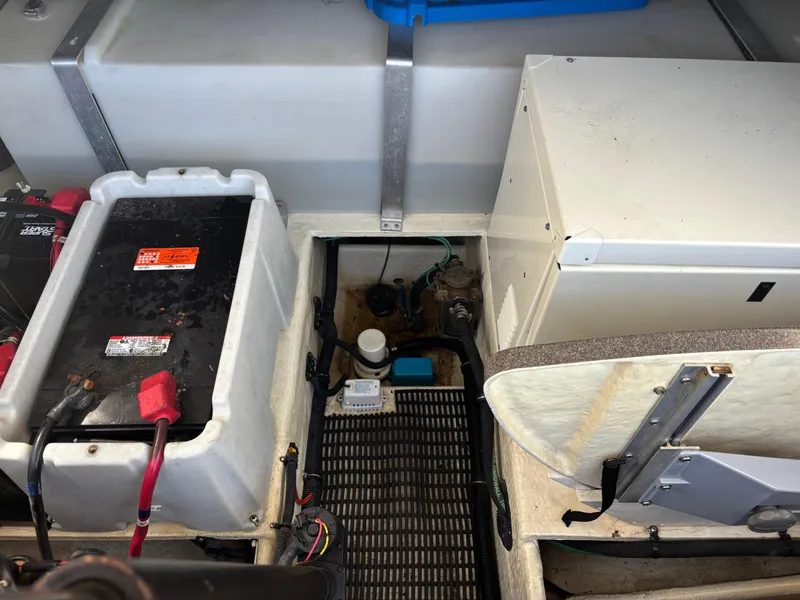 Slide: The Image of 2006 Regal Commodore 3560 IO engine compartment with battery and electrical components. - 27