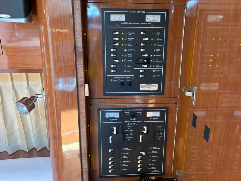 Slide: The Image of Electrical control panel on a 2006 Regal Commodore 3560 IO yacht. - 42