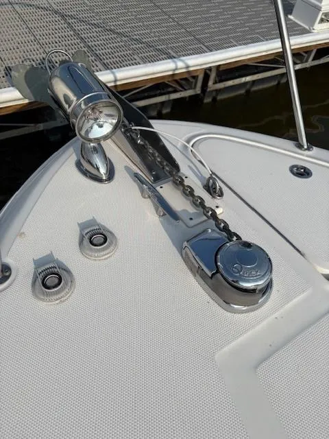 Slide: The Image of Bow of 2008 Sea Ray 270 Amberjack with anchor chain and spotlight. - 11