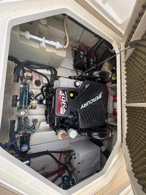 Slide: The Image of Engine compartment of a 2008 Sea Ray 270 Amberjack with Mercury 496 engine. - 15