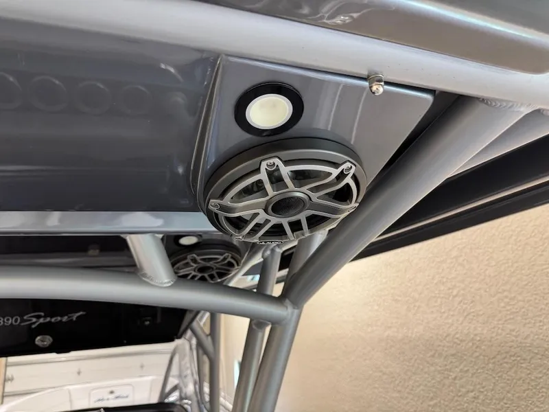 Slide: The Image of 2024 Nor-Tech 390 Sport Center Console speaker and light detail. - 13