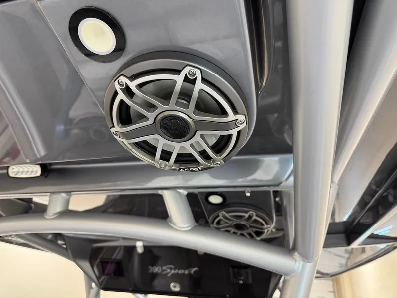 Slide: The Image of Speaker system on 2024 Nor-Tech 390 Sport Center Console boat, featuring sleek design and modern technology. - 18