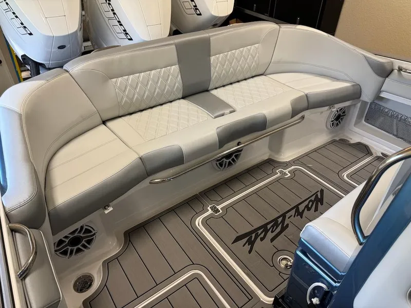 Slide: The Image of 2024 Nor-Tech 390 Sport Center Console with luxurious seating and sleek design. - 21