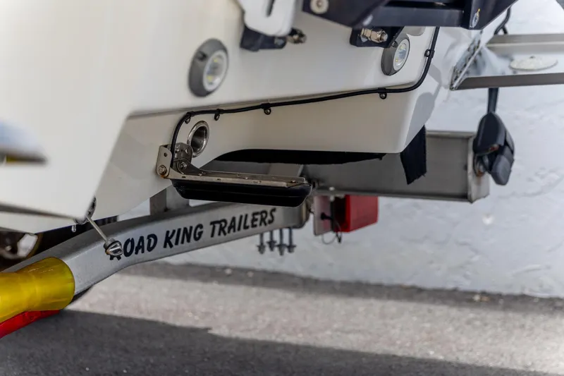 Slide: The Image of Trailer for 2025 Crevalle 24 HCO boat, featuring Road King Trailers branding. - 41