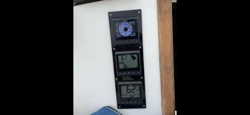 Slide: The Image of Sailing instruments on 1985 O'Day 35 yacht, displaying speed, wind, and navigation data. - 22