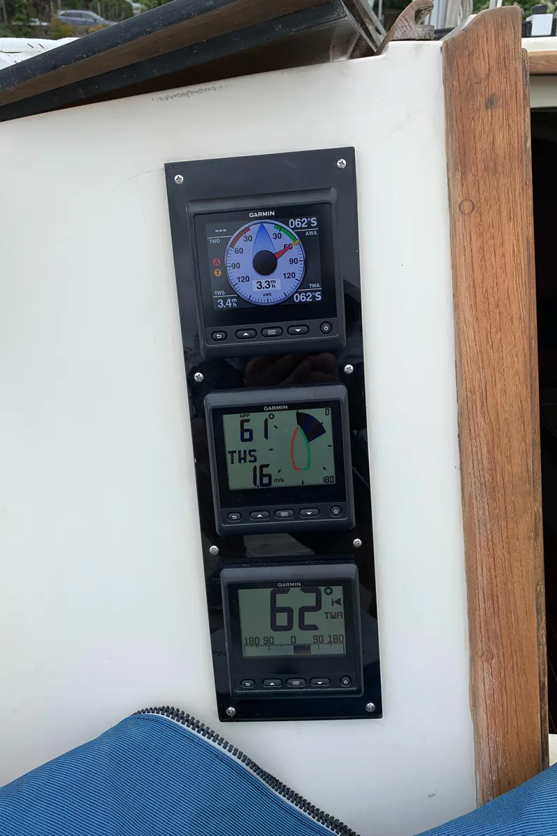 Slide: The Image of Sailing instruments on 1985 O'Day 35 yacht, displaying speed, wind, and temperature data. - 7