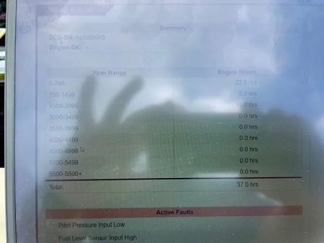 Slide: The Image of Display screen showing engine RPM range and hours for 1997 Cobalt 232. - 16