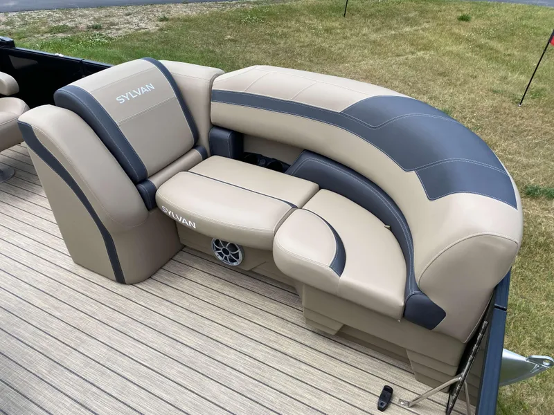 Slide: The Image of Luxurious seating on 2025 Sylvan L1 LZ Tritoon boat with Mercury 150HP engine. - 11