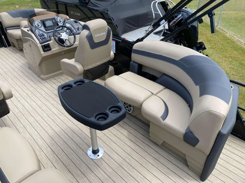 Slide: The Image of Luxurious 2025 Sylvan L1 LZ Tritoon interior with plush seating and modern dashboard. - 4
